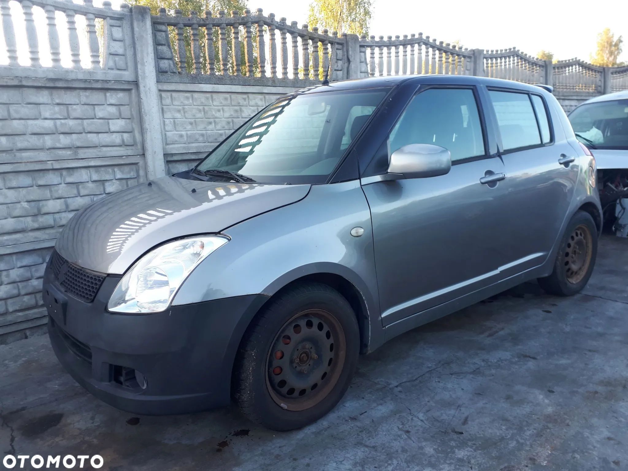 SUZUKI SWIFT 04-08 BŁOTNIK PRZÓD PRZEDNI PRAWY LEWY - 1