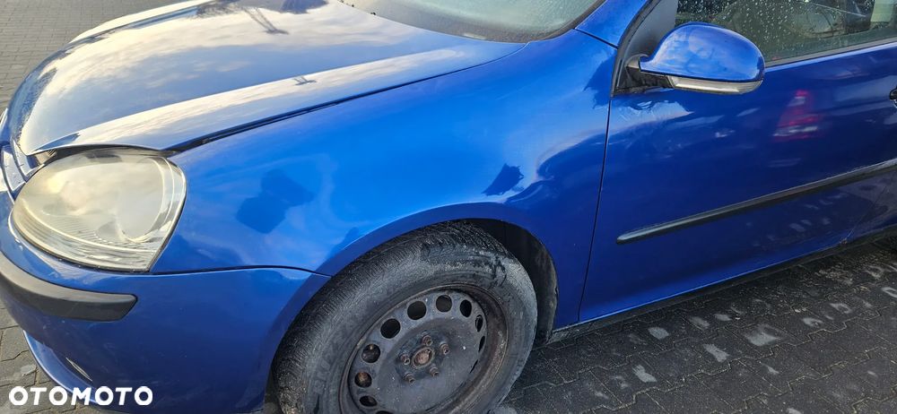 Błotnik  lewy przedni VW Golf 5 V 2005r 3d hatchback LC5J - 1