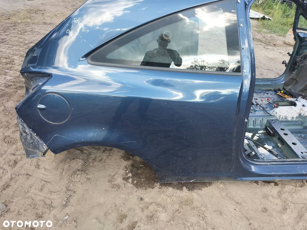 ĆWIARTKA BŁOTNIK PRAWY TYŁ OPEL CORSA D LIFT Z22A - 1