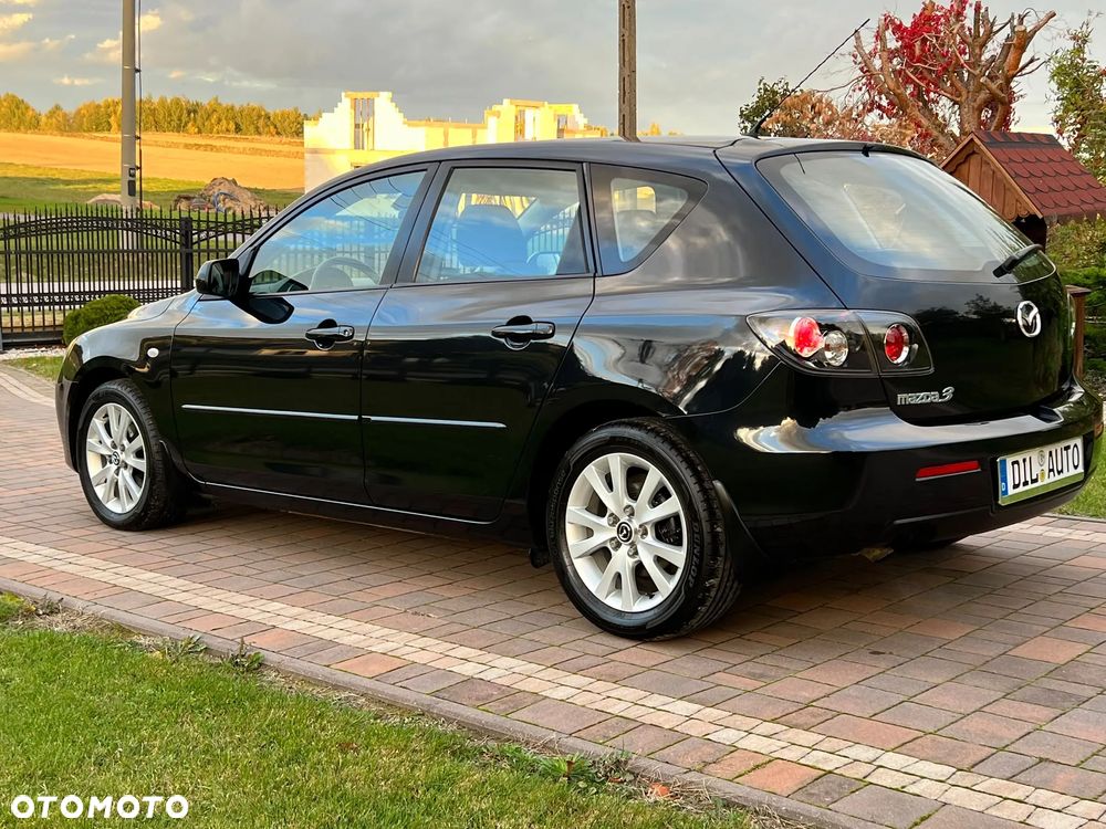 Mazda 3 2007 photo 4
