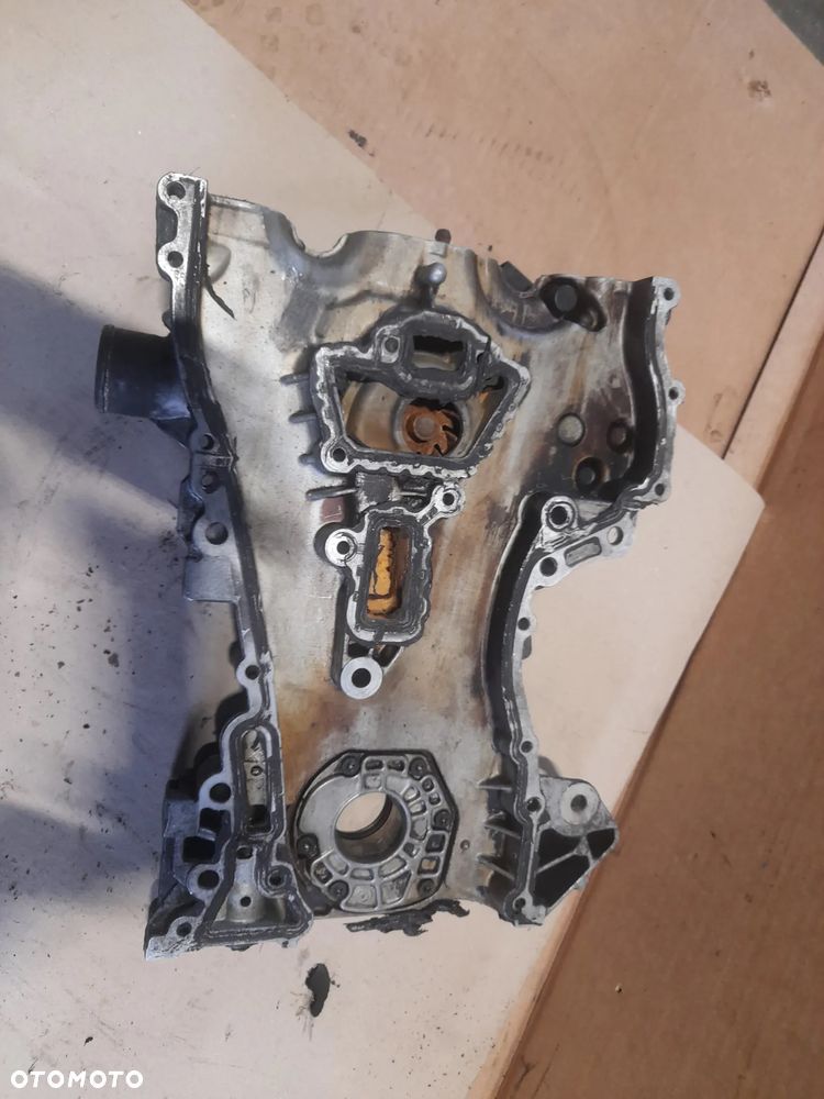 Osłona rozrządu pompa oleju Opel Corsa Astra 1.2 1.4 16V 55556309 - 2