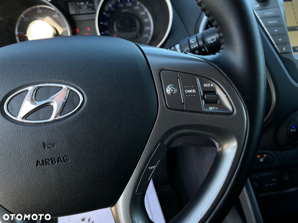 Hyundai ix35 1.7 CRDi 2WD blue Finale Gold - 11