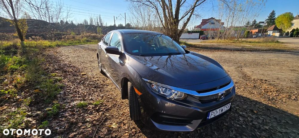 Honda Civic 2.0 i-VTEC LX CVT - 1