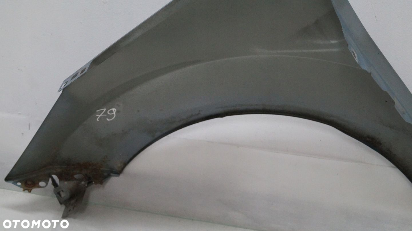 BŁOTNIK PRZEDNI PRAWY FORD FIESTA MK7 79 - 10