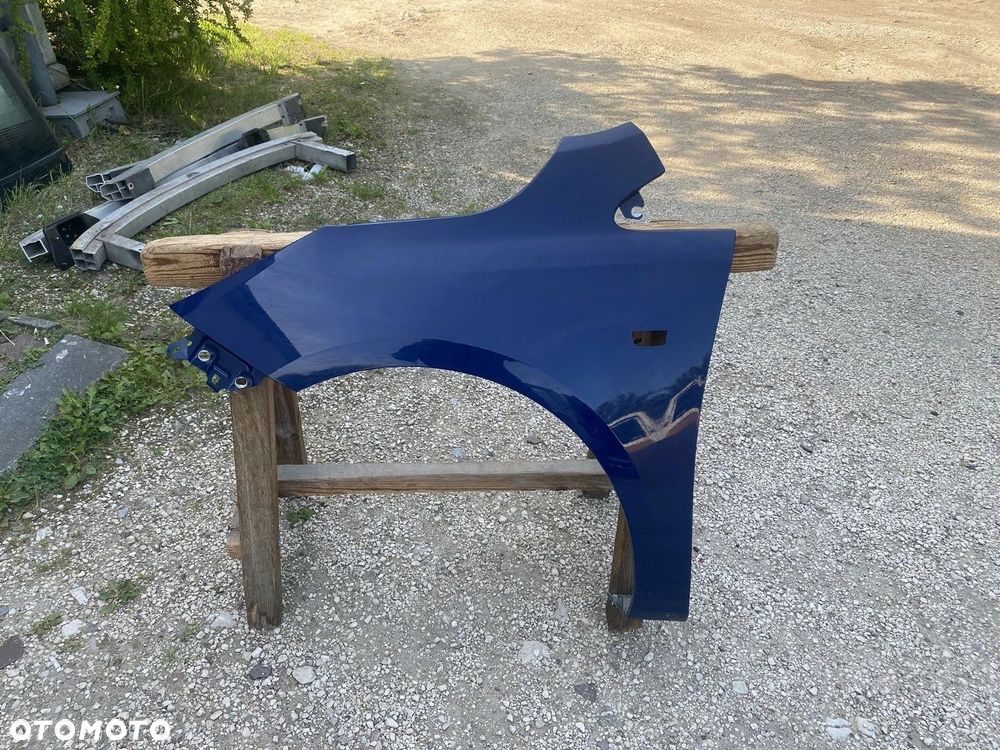 BŁOTNIK PRZEDNI LEWY OPEL CORSA E 14-19 13434576 - 1