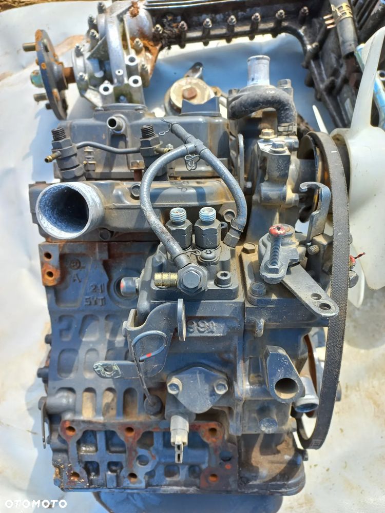 Części Kubota silnik Z602,chłodnica,koło zamachowe,wtrysk,napęd GR 2000,alternator,rozrusznik,piasta - 4
