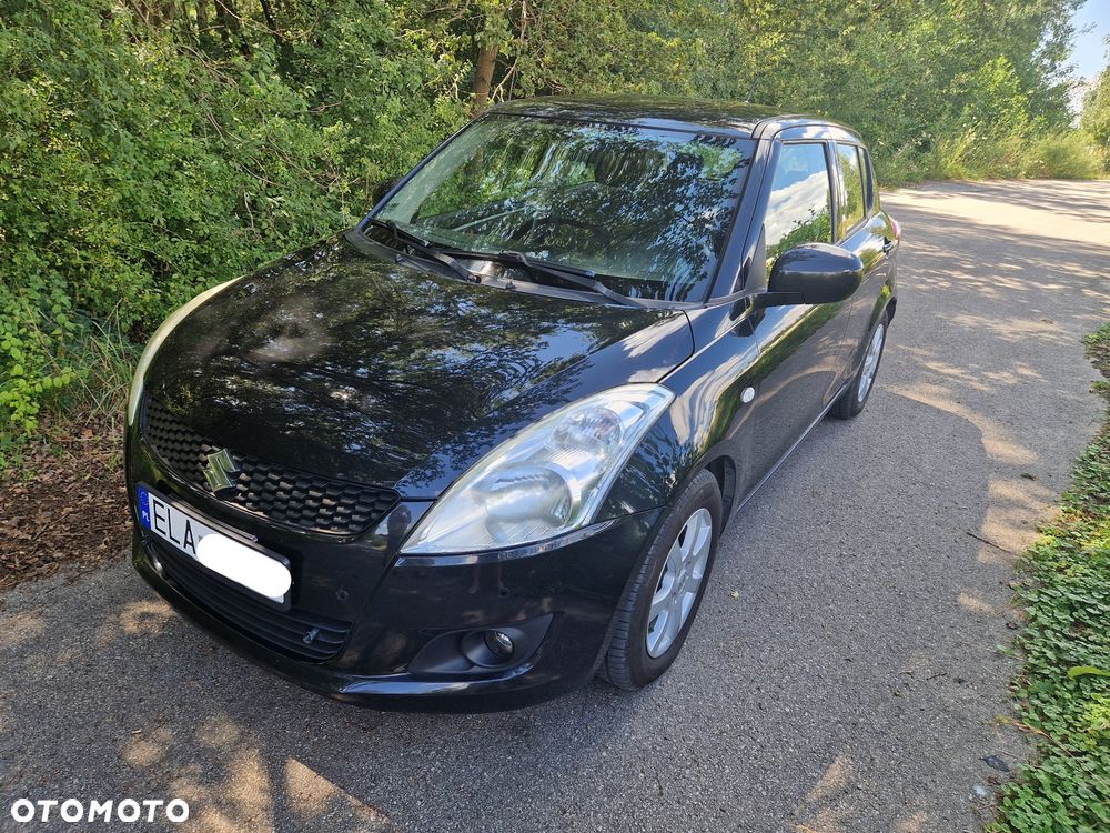 Suzuki Swift 1.2 Premium - 1