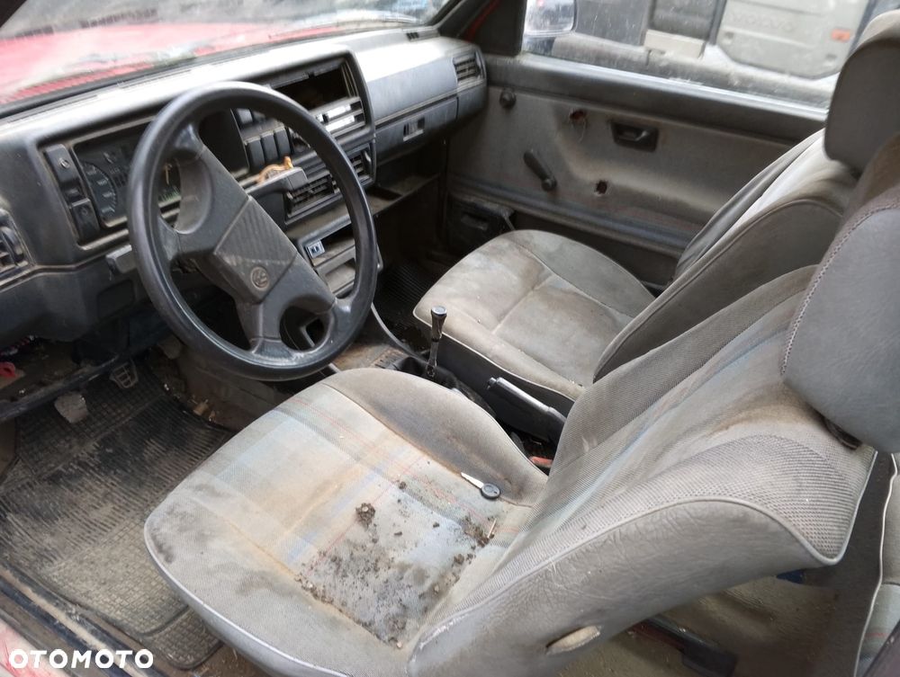 Volkswagen Golf II FL (87-92r.) 1.6 B 69KM. Silnik PN Skrzynia 4S12114 lakier G2 / LY3D.Cały na części. GWARANCJA !!! Przód Tył Zestaw Komplet Drzwi Klapa Zderzak Błotnik Maska Grill Atrapa Szyba Pas Lampa Lusterko Boczki Fotel Kanapa Kokpit Deska Rozdzielcza Przełącznik Włącznik Sterownik Przewody Wiązka Instalacja Moduł Komputer Czujnik Listwa Pompa Alternator Wtryski Głowica Rozrusznik Kompresor Sprzęgło Dwumas Silnik Skrzynia ABS Klimatyzacji Paliwa Wspomagania Kolektor Turbina Przepustnica Zawór Chłodnica Koło Hak Belka Sanki Zawieszenie Mcpherson Półoś Amortyzator Wydech Tłumik Zacisk Most - 9