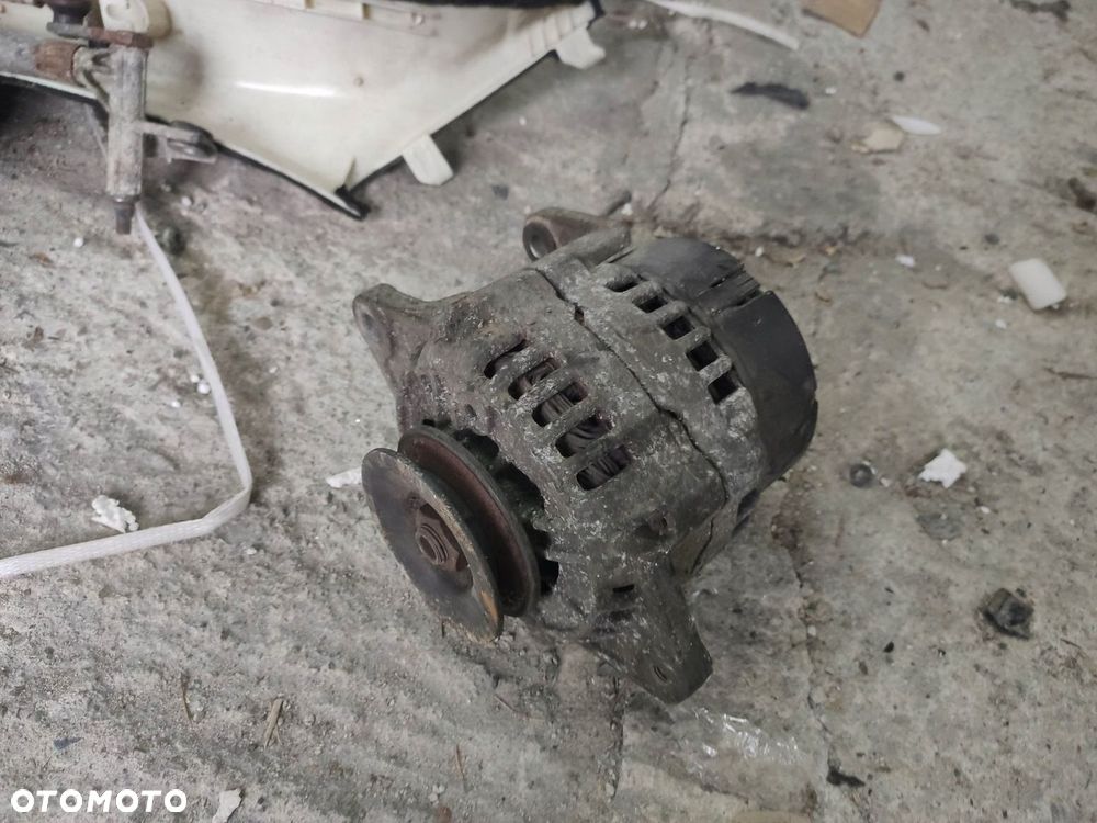 WS ALTERNATOR SILNIKA NISSAN TERRANO II 2.7 23100-7F000 - 1