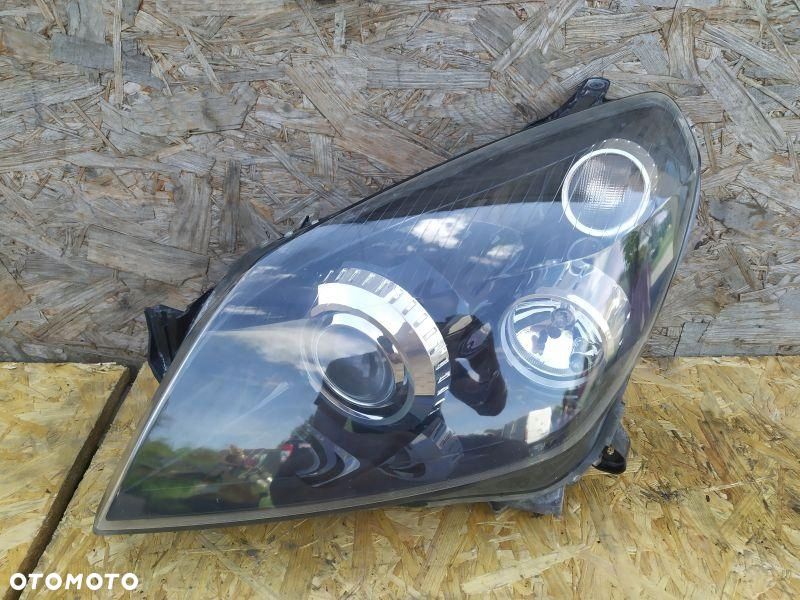 REFLEKTOR LEWY BIKSENON EU LAMPA LEWA PRZEDNIA PRZÓD OPEL ASTRA III H - 1