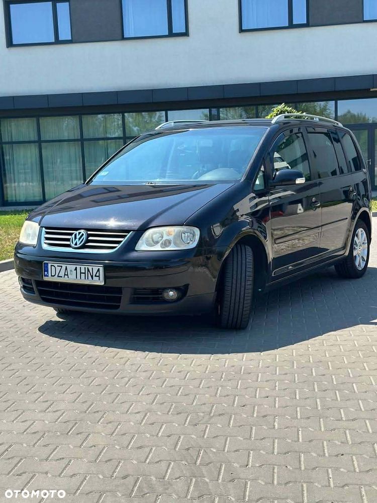 Volkswagen Touran 2.0 FSI Highline - 1