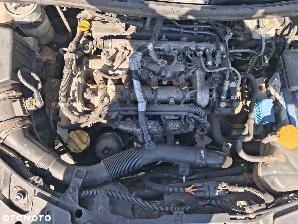 Opel Corsa D 3 silnik kompletny 1.3 CDTI diesel skrzynia biegów F17 W394 drzwi klapa zderzak błotnik kolor biały Y474 sprzęgło szyba deska wyświatlacz pas fotel podsufitka alternator maglownica pompa sterownik panel sterownik mcperson wahacz zwrotnica belka sanki przewód wąż wiązka poduszka lampa reflektor zamek zacisk radio stacyjka boczek obudowa osłona tłumik wydech kolektor wtrysk czujnik NA CZĘŚCI - 7