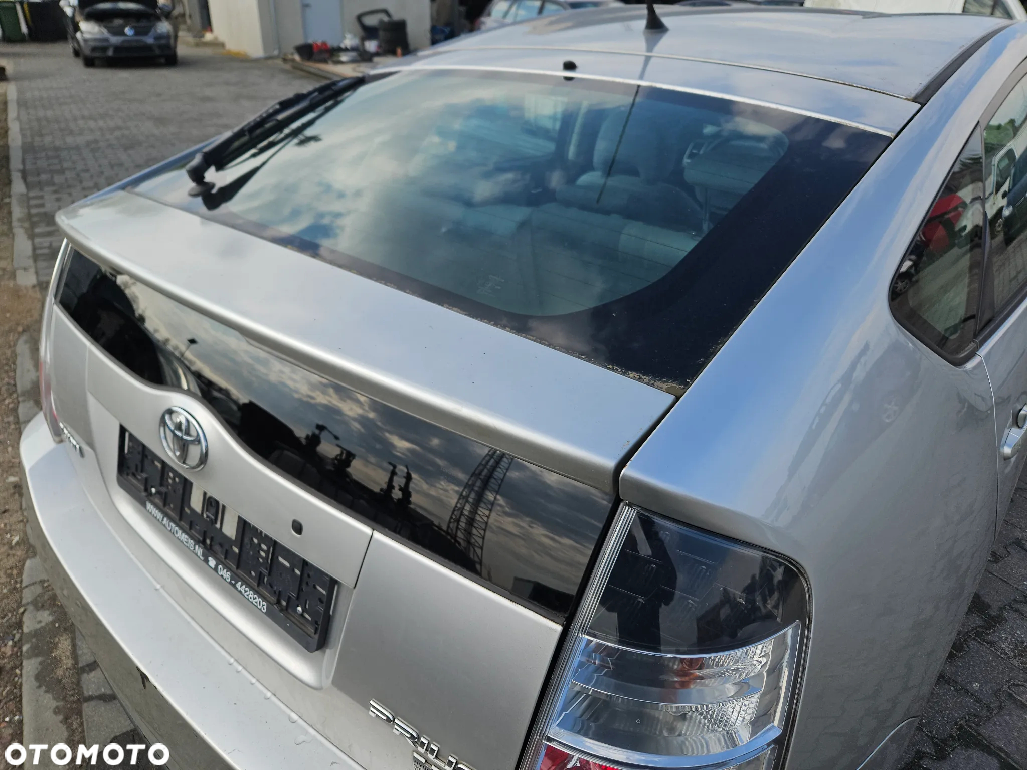 Klapa bagażnika zderzak tylny tył Toyota Prius II 2005r lak. 1C0 - 2