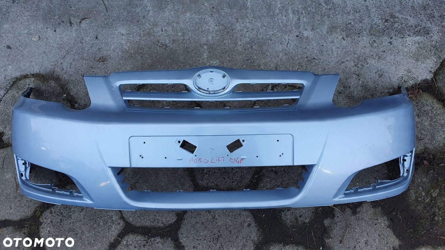 Toyota Corolla E12 04- zderzak przedni przód € - 5