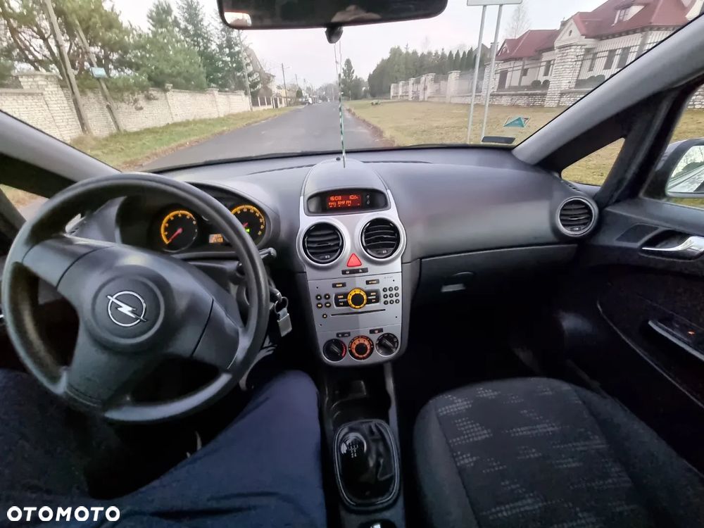 Opel Corsa 1.2 16V Enjoy - 23