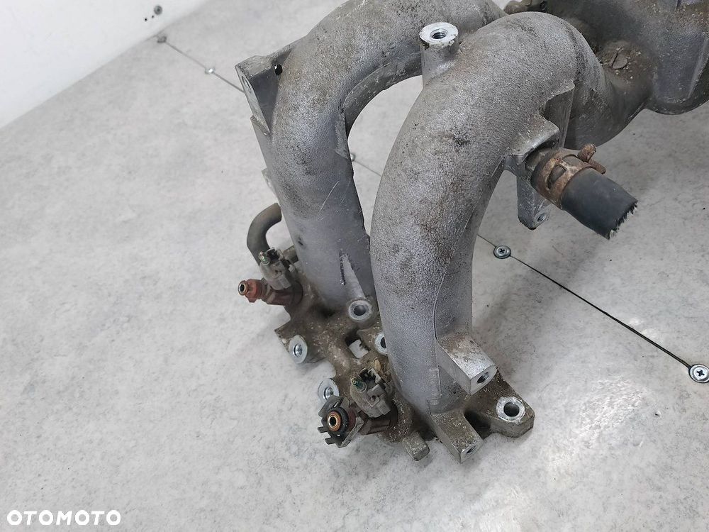 KOLEKTOR SSĄCY SUBARU IMPREZA II 1.6 16V - 9