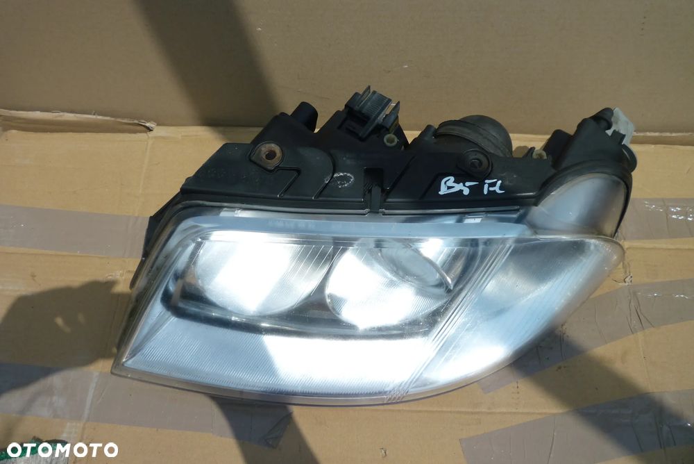 Lampa lewa VW Passat B5 lift Hella Europa - 2