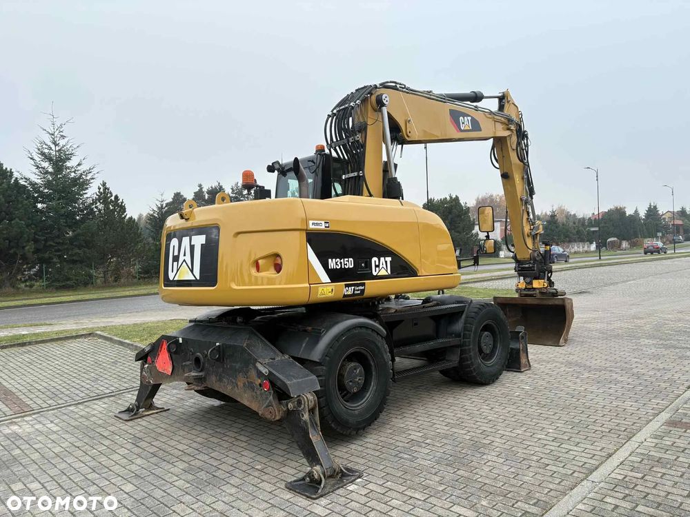 Caterpillar M 315D ROTOTILT ENGCON SZCZYPCE PODPORY - 11