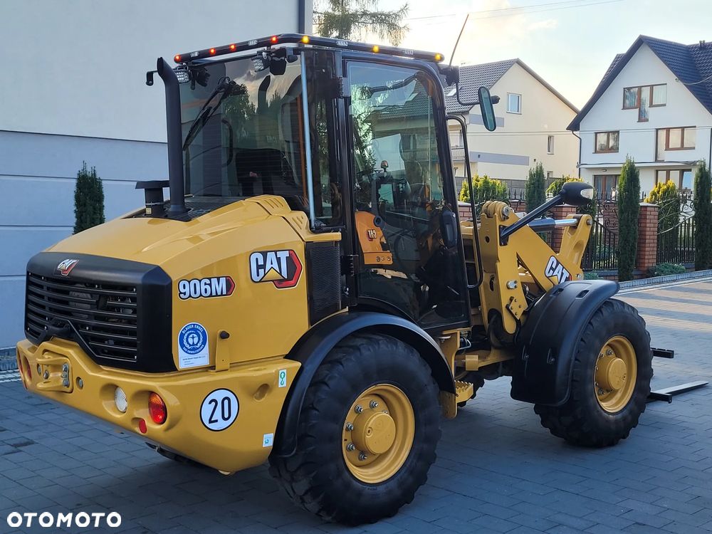 Caterpillar 906M / widły + łyżka otwierana / model 2022 r. / STAN IDEALNY / - 2