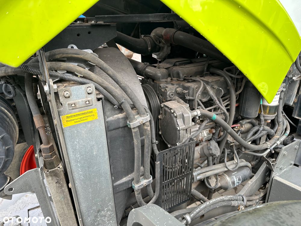Claas Axos 320 - 12
