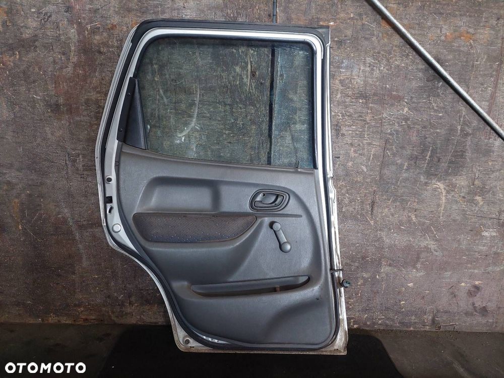 DRZWI KOMPLETNE LEWY TYŁ SUZUKI IGNIS I 5D Z2S - 5