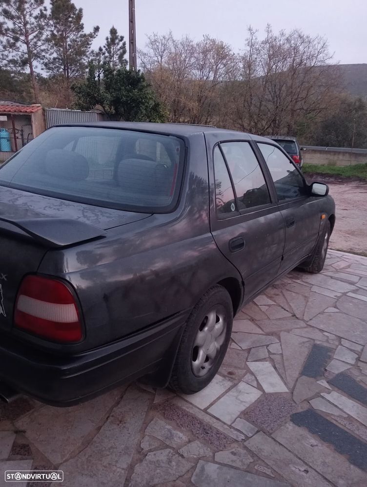 Nissan Sunny Hatchback 1.4 SLX - 13