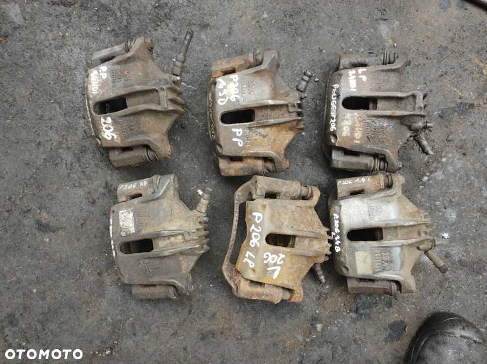 PEUGEOT 206 1,4 zacisk hamulcowy 1,9 jarzmo - 2