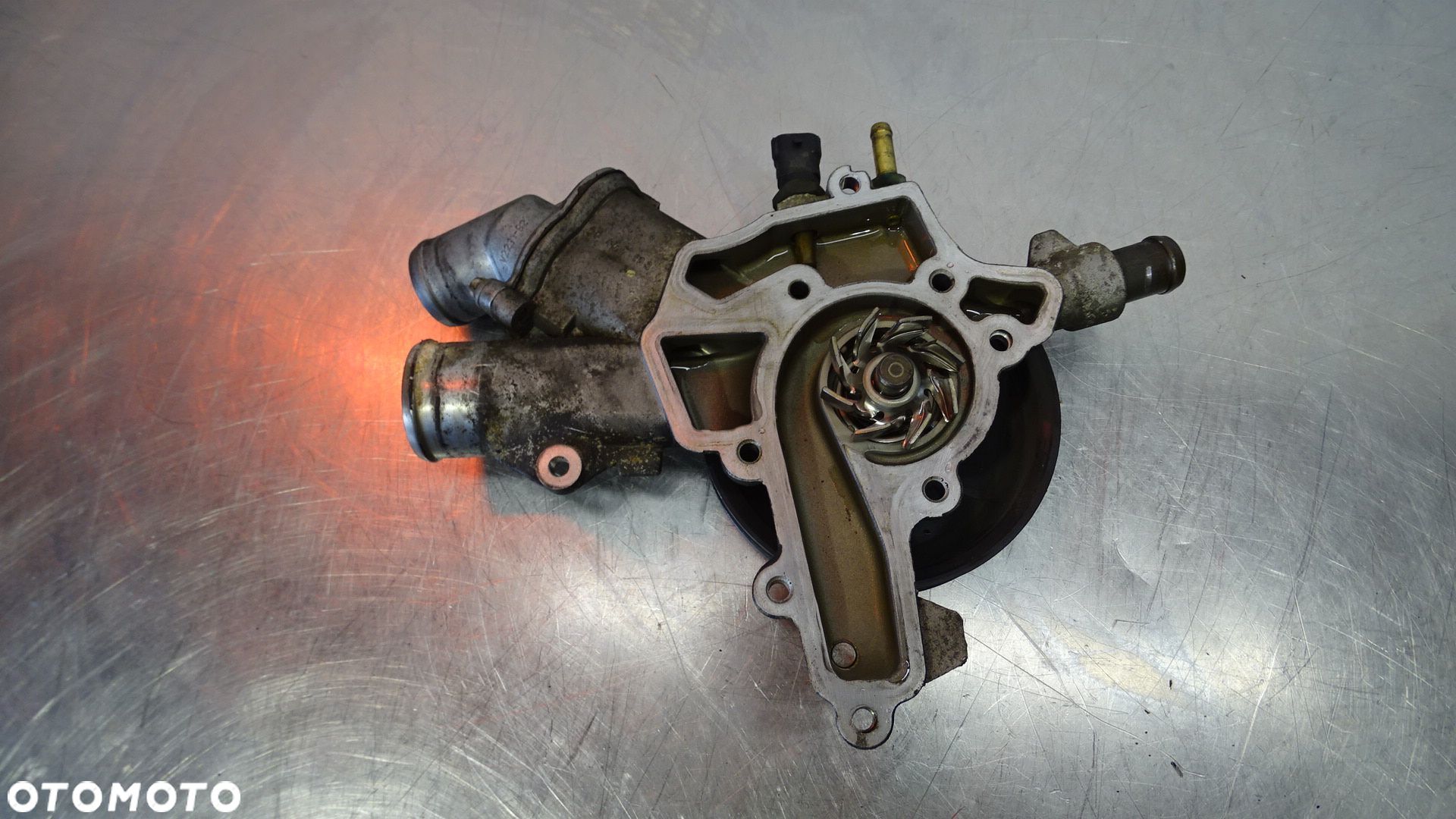 POMPA WODY OPEL CORSA D 1.0 24469103 - 1