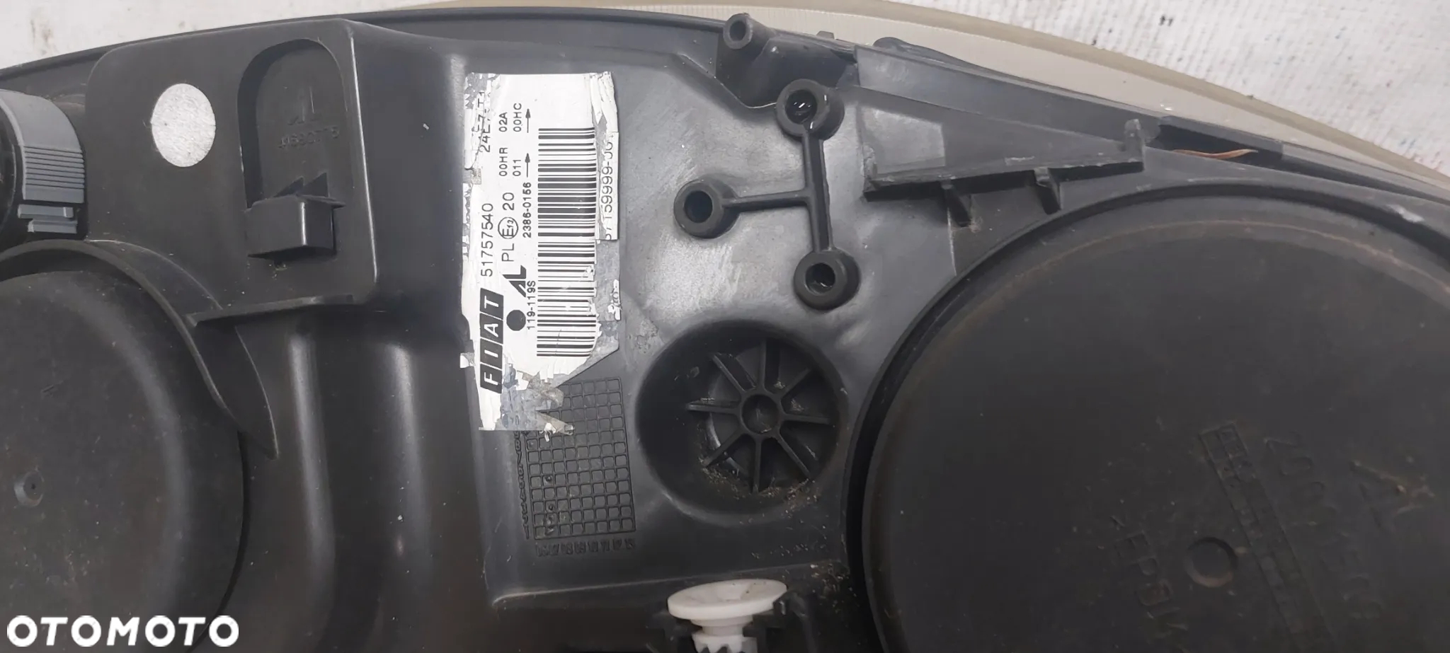 .  PRZOD PRZEDNIA LAMPA LEWA FIAT BRAVO 2 - 4