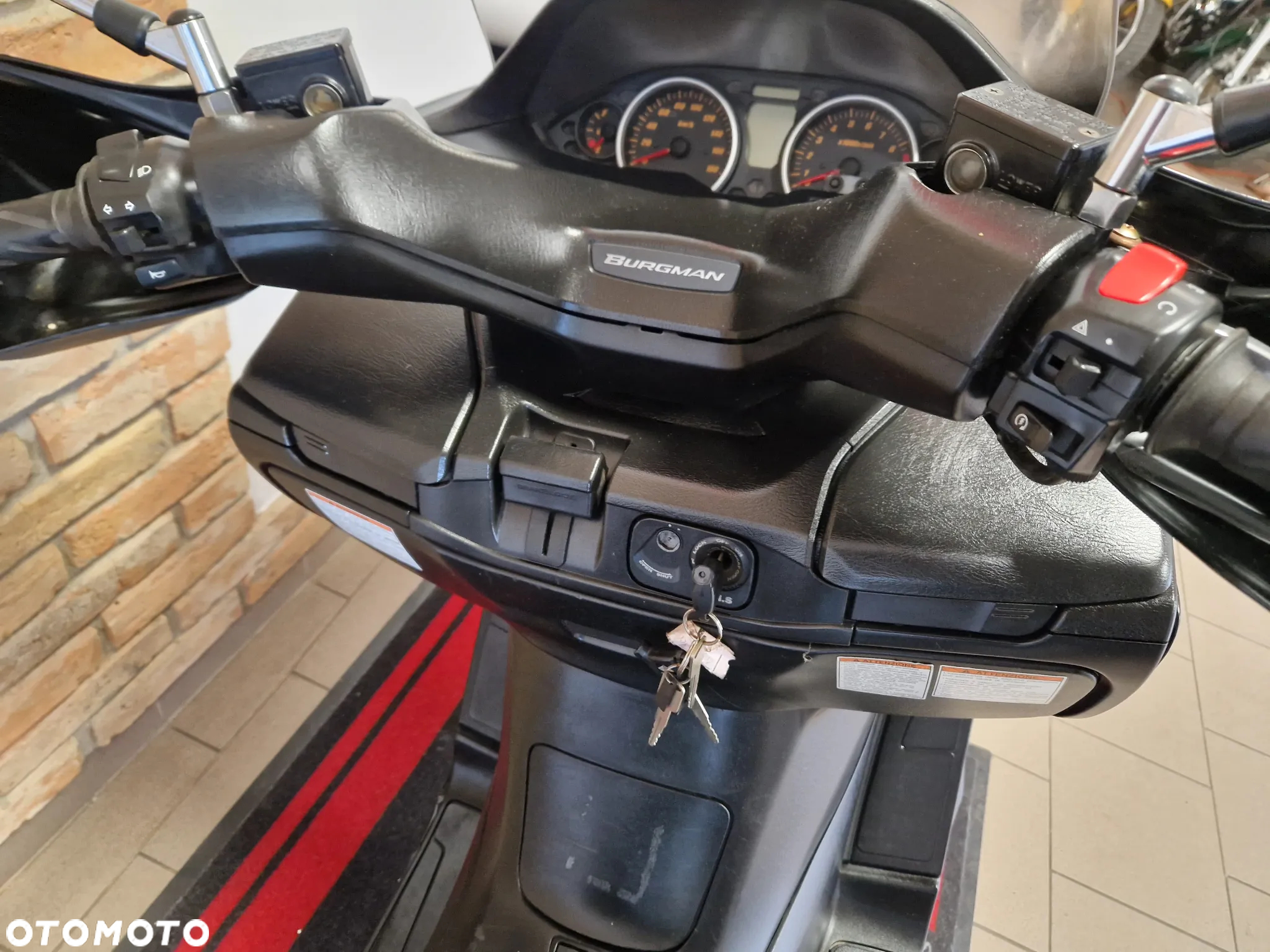 Suzuki Burgman - 23