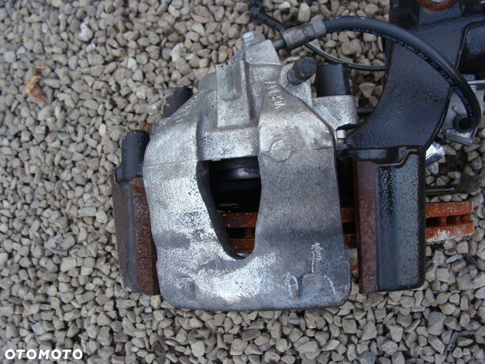 amortyzator zwrotnica lewa vw taigo kamiq arona 2q0413031dr - 6