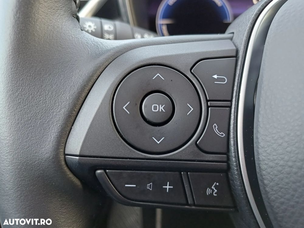 Toyota Corolla TS 1.8 HSD Exclusive - 25