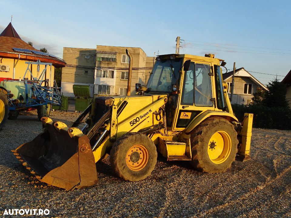 Buldoexcavator Case 580 SK,  din  95  piese - 2