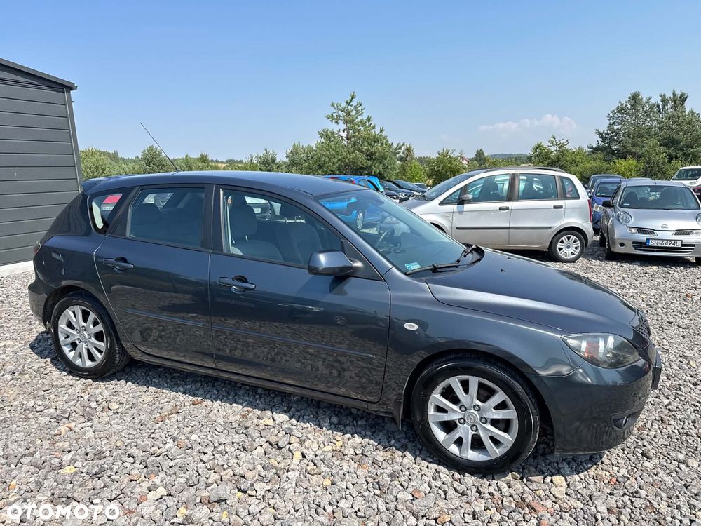 Mazda 3 1.6 Exclusive + - 4