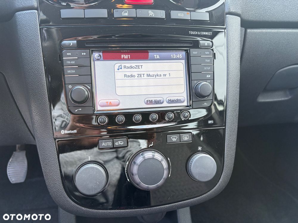 Opel Corsa 1.4 16V Cosmo - 21