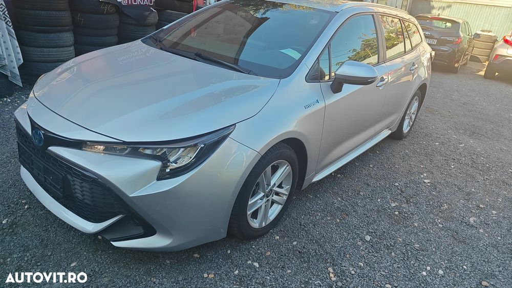 Toyota Corolla 1.8 HSD Business - 8