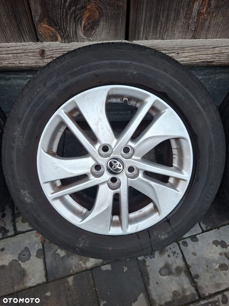 Koła Felgi Toyota OE YARIS 6.0" x 15" 5x100 ET 45 Opony 23r - 9