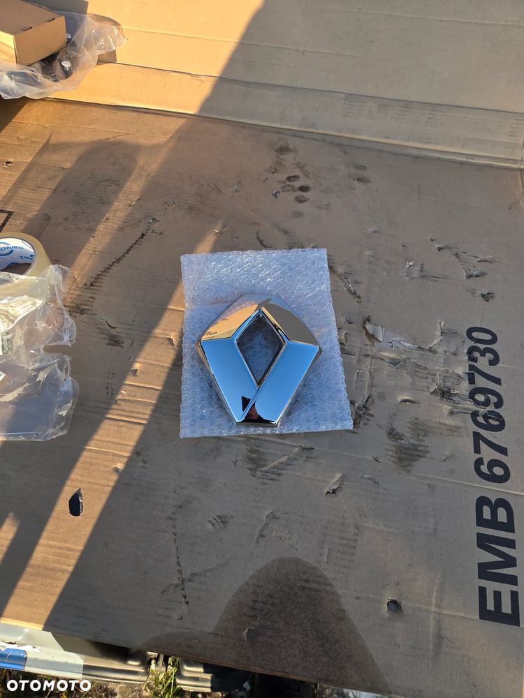 Znaczek emblemat Logo Renault Captur Clio IV Megane III Scenic III 628909470R - 2