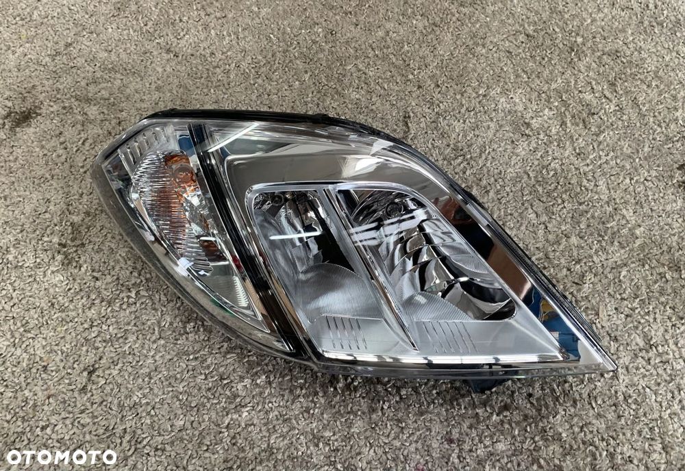 NISSAN NV400 REFLEKTOR LEWY LAMPA - 1