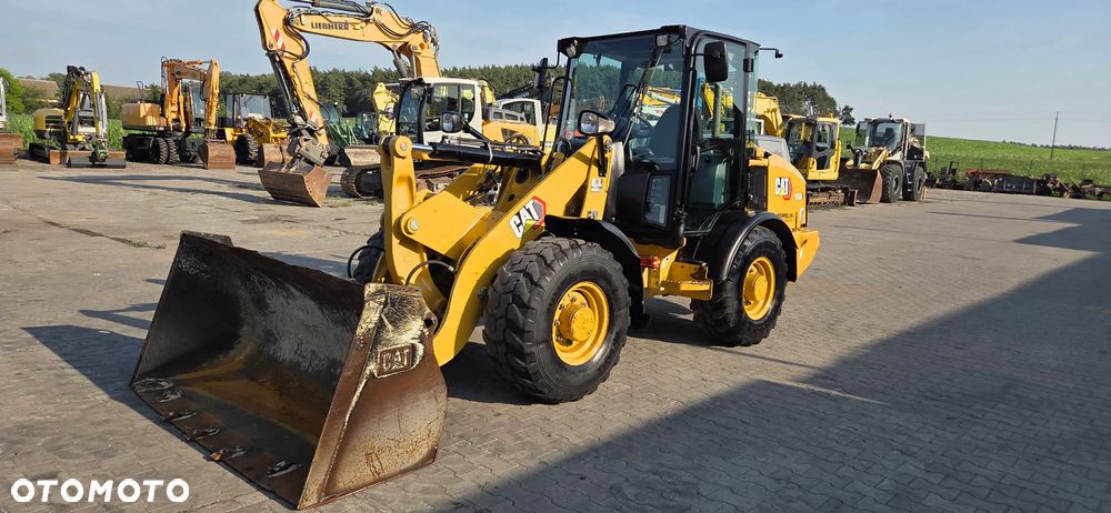Caterpillar <<Caterpillar 906M, 2016r,5000 Mtg ,łyżka+widły, z Niemiec!>> - 2