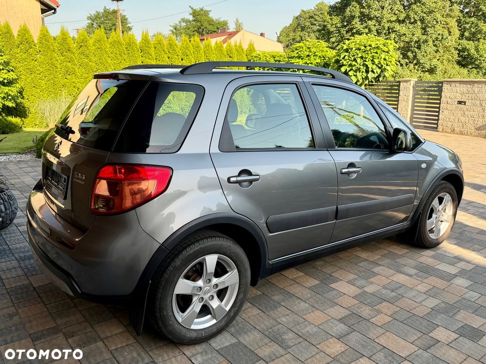 Suzuki SX4 1.6 Comfort Plus - 8