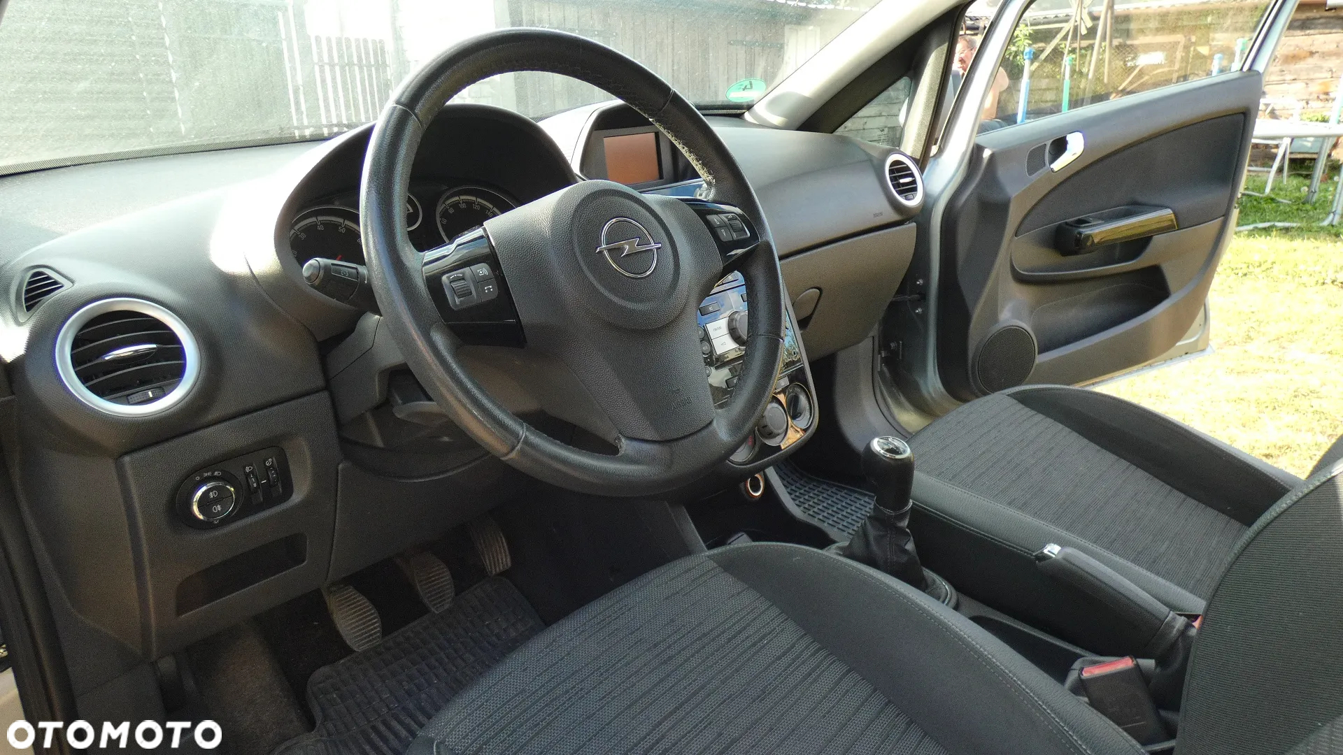 Opel Corsa 1.2 16V Enjoy - 11