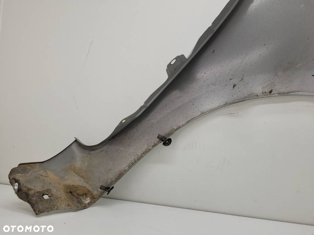 BŁOTNIK PRZÓD LEWY TOYOTA YARIS II 3D 2006 3 DRZWI EUROPA - 8