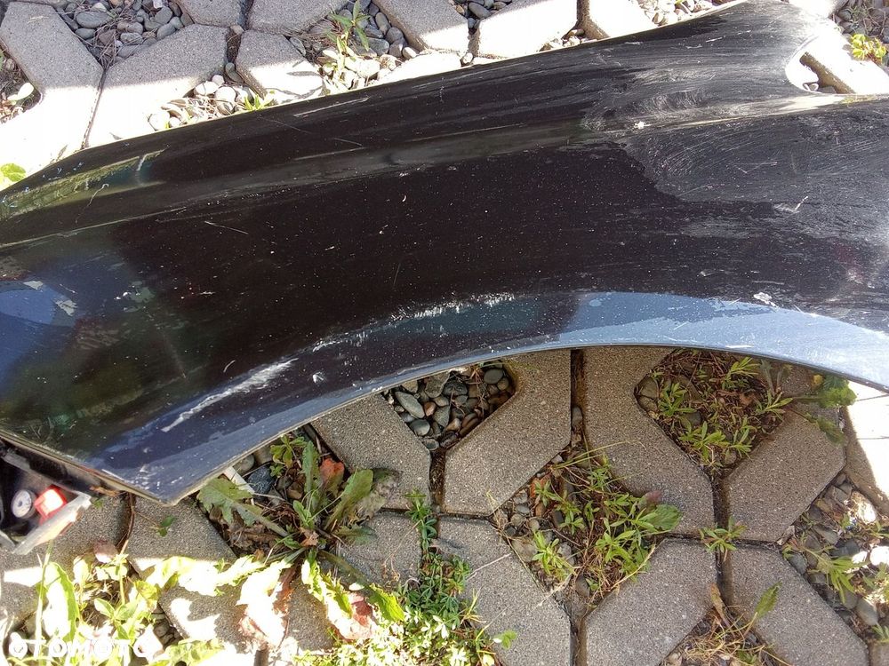 KL BŁOTNIK LEWY PRZÓD OPEL CORSA D 06- 5D - 3