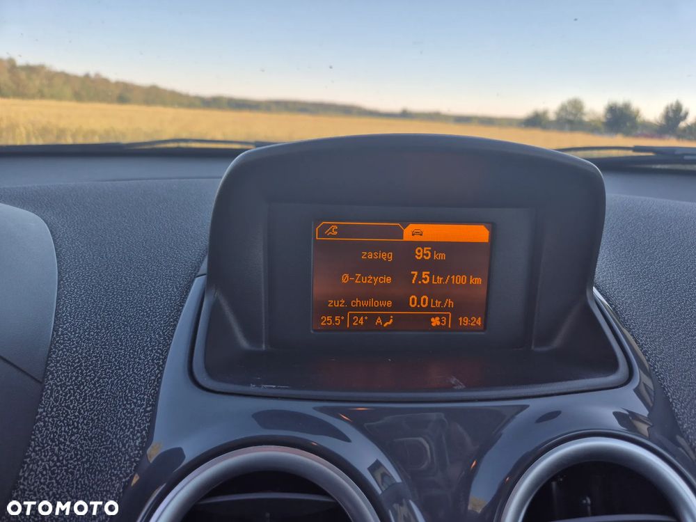 Opel Corsa 1.4 16V Enjoy - 12