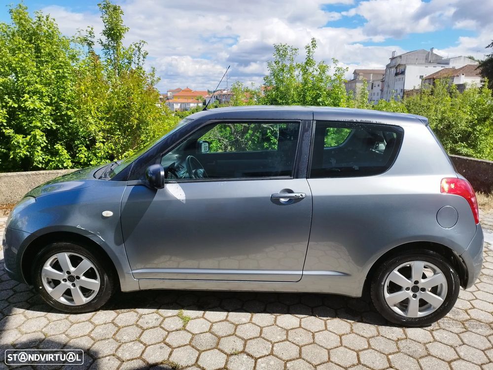 Suzuki Swift 1.3 DDiS GLX - 1