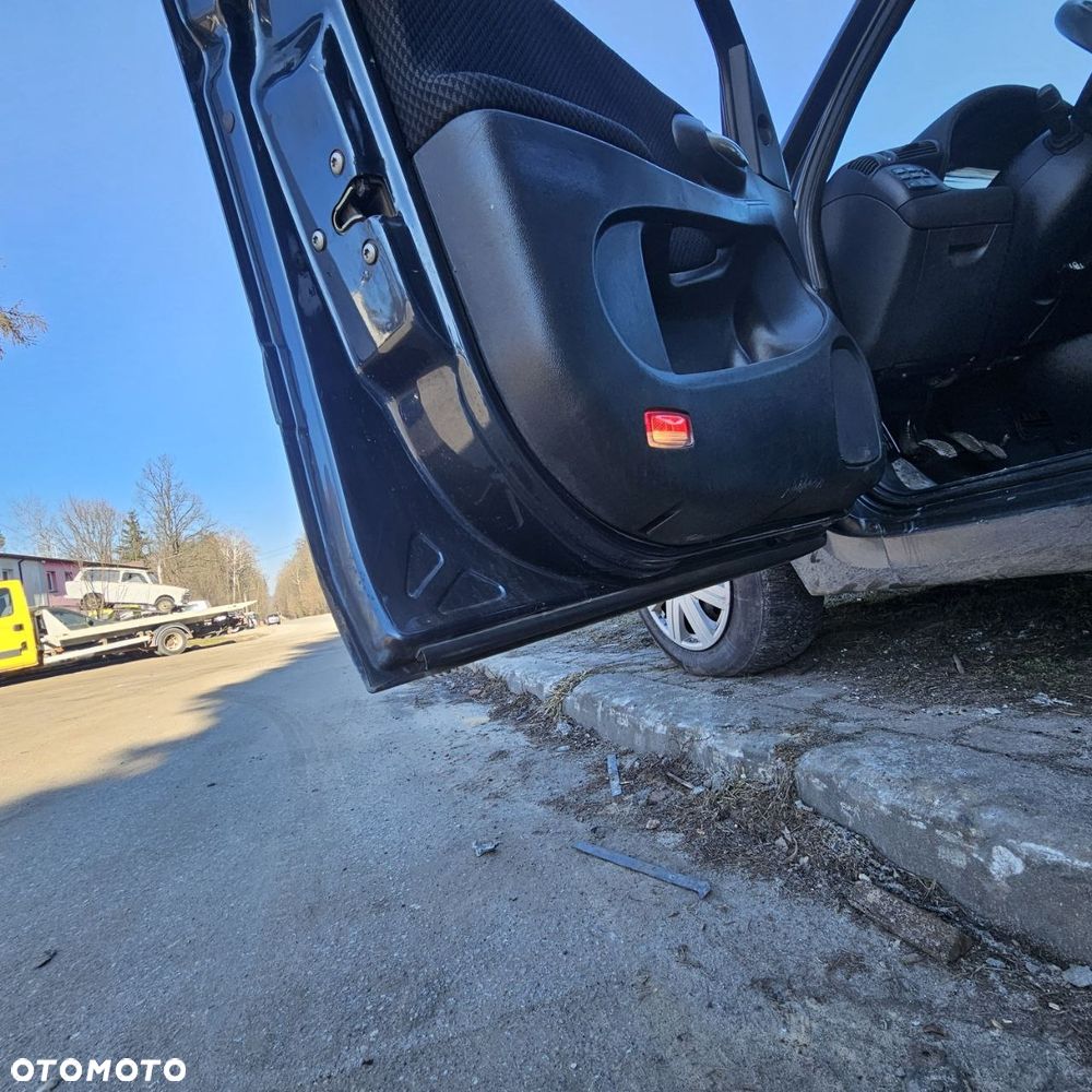 Fiat Stilo 1,6 B 76 kW / 103 KM (2003 kombi) (kod lak: 675) pojazd na części: maska, zderzak, drzwi, szyby, lusterka, chłodnica ... - 14