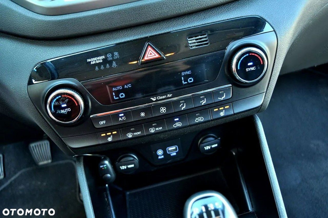 Hyundai Tucson blue 1.7 CRDi 2WD Intro Edition - 32