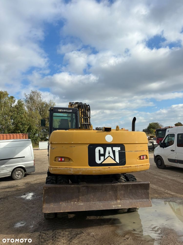 Caterpillar M318C - 8