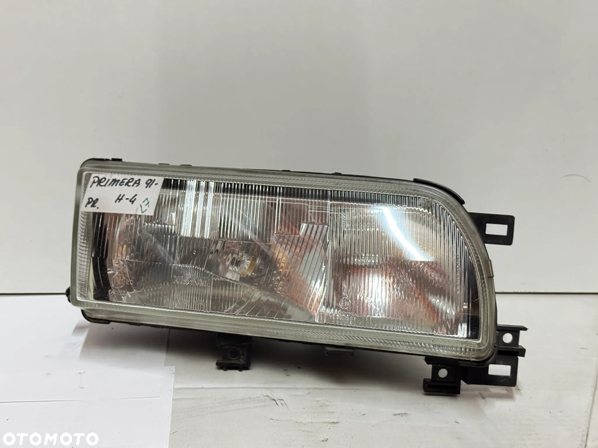 LAMPA REFLEKTOR GŁÓWNY PRAWY NISSAN PRIMERA 1991- - 2